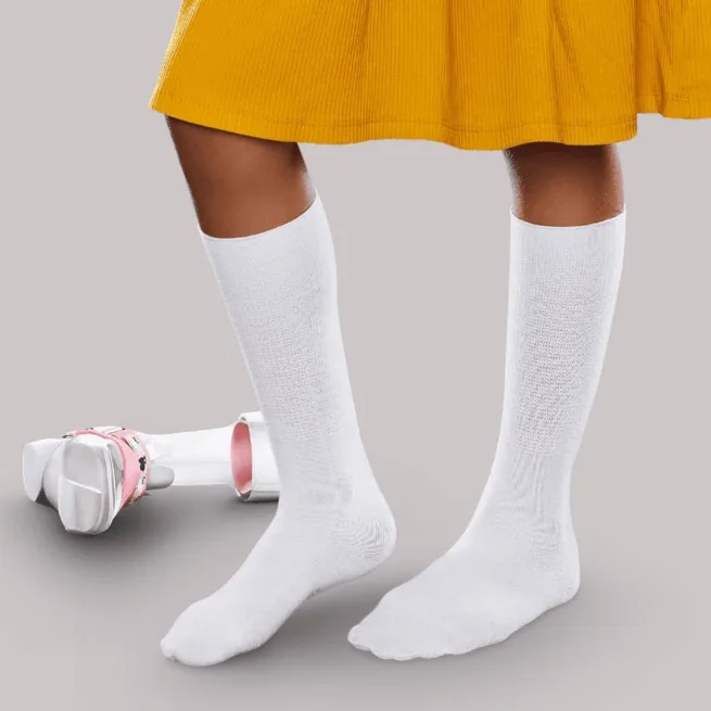 Young girl wearing white AFO seamless socks