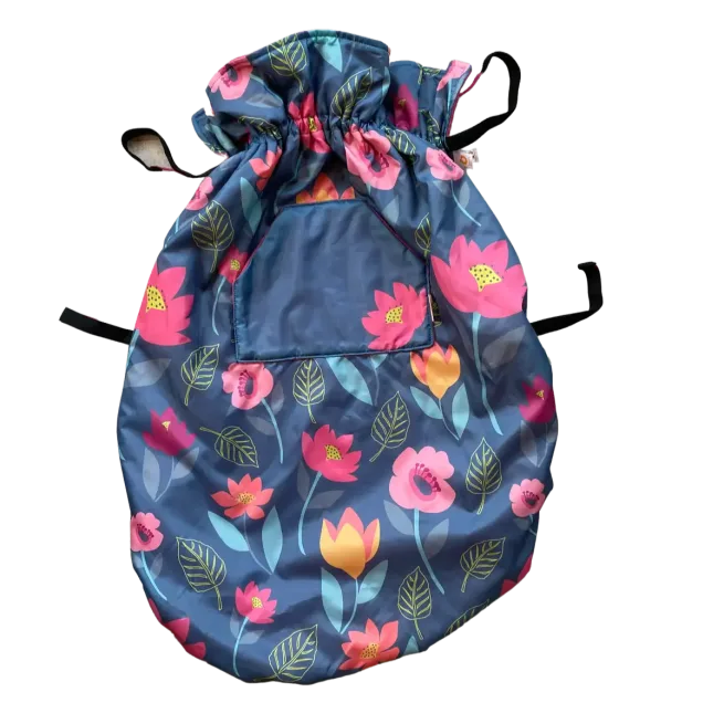 Product shot of the Bundlebean Wheelchair Cosy on multicolour floral design