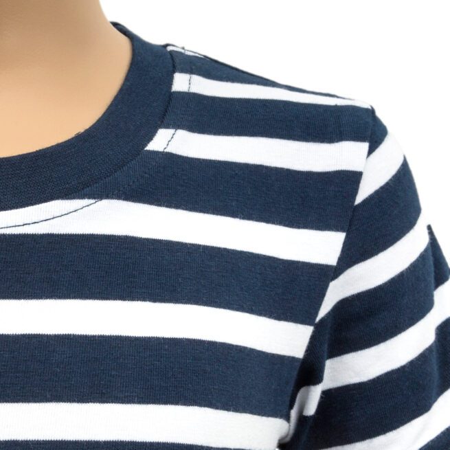 Close up of person wearing navy white stripe popper vest - shoulder only