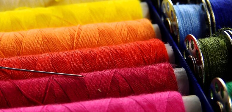 Image of different coloured threads with the caption 'Have you ever wondered what inspires someone to start a business?