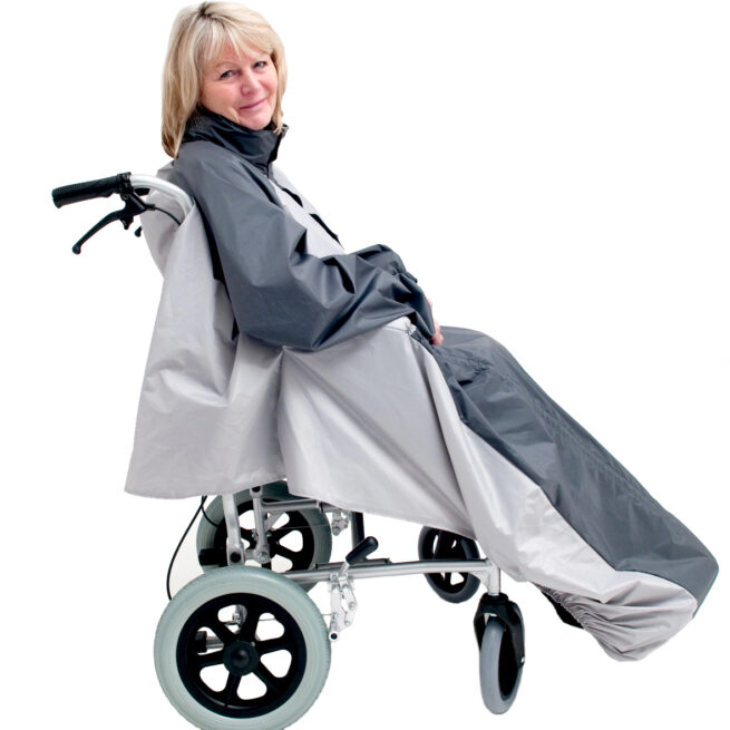 Side view of woman in wheelchair wearing Black Grey wheelchair coat