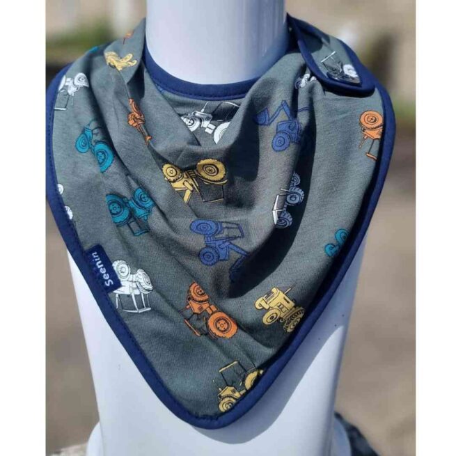 Side fastening kerchief in grey with colourful tractor print.