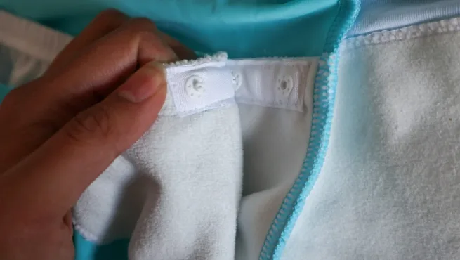 Popper lining on swimsuit