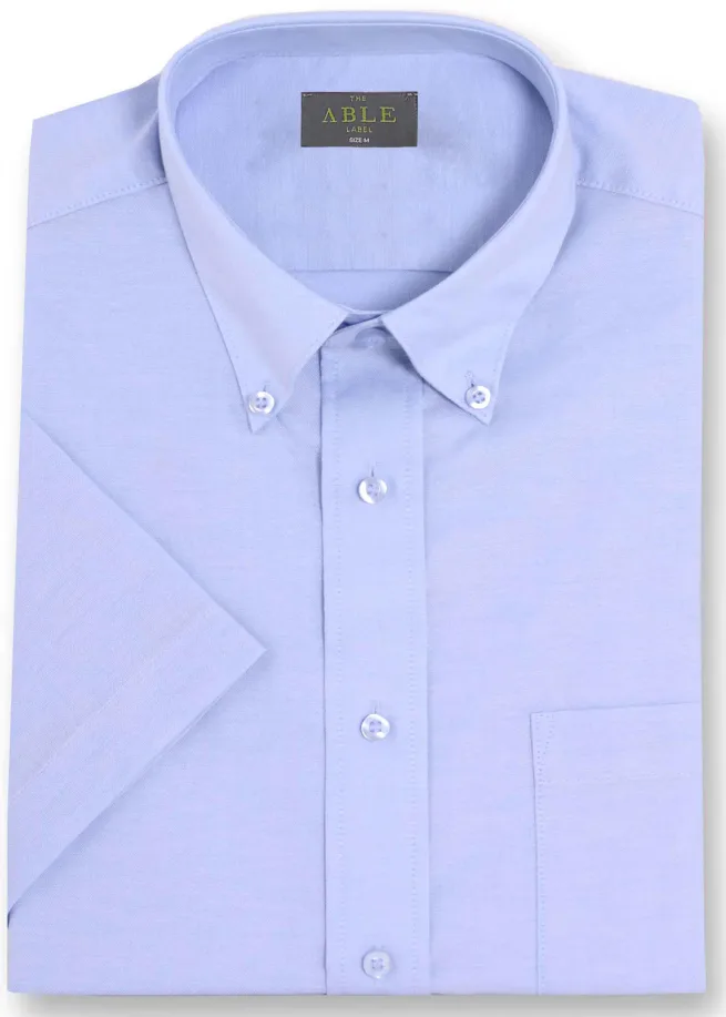Product shot of folded Hugh short sleeve oxford blue shirt