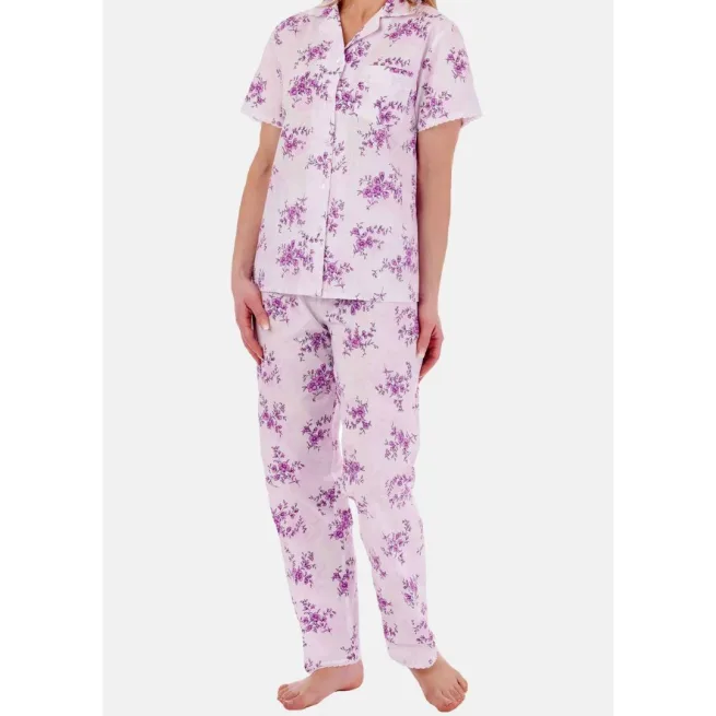 Woman standing wearing Clementine floral front opening pj's