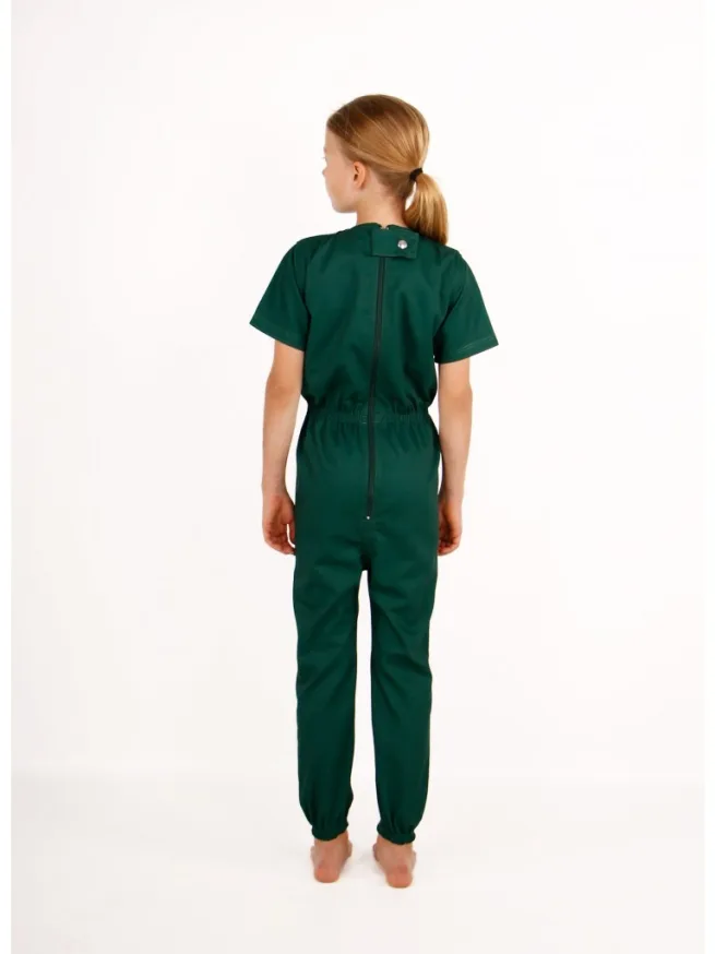 Back view of girl wearing green zip back bodysuit with short sleeves and long legs
