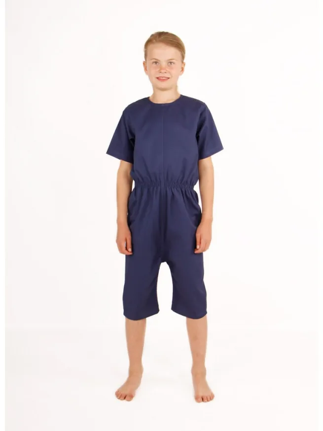Boy wearing navy rip resistant bodysuit with short sleeves and knee length
