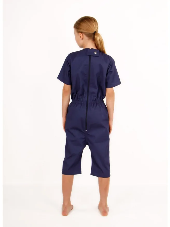 Girl wearing navy rip resistant bodysuit with short sleeves and knee length - back view