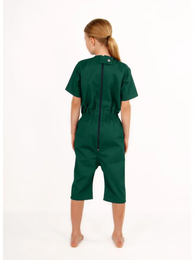 Girl wearing green rip resistant bodysuit with short sleeves and knee length - back view