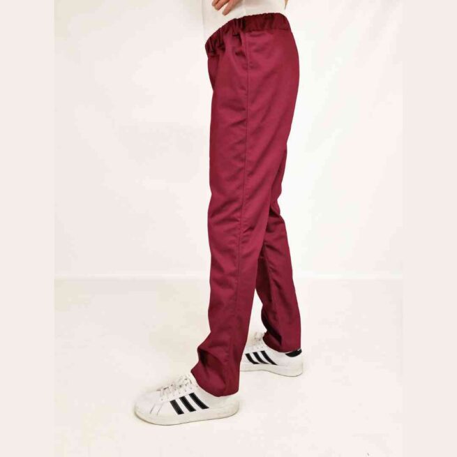 Man wearing rip resistance trousers in red - side