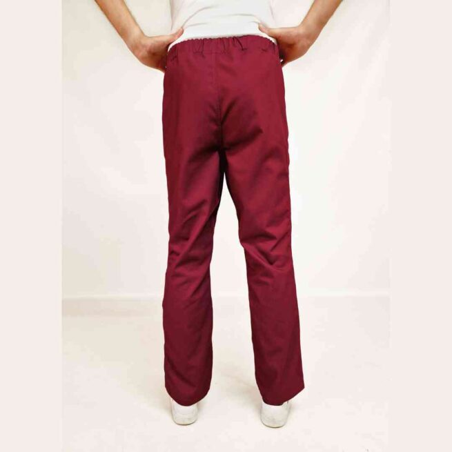 Man wearing rip resistance trousers in red - back view